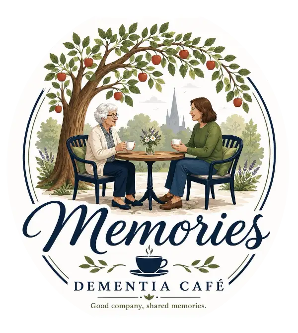 Memories Dementia Café: twa freens sharin tea aneath an aipple tree. Guid company, shared memories.